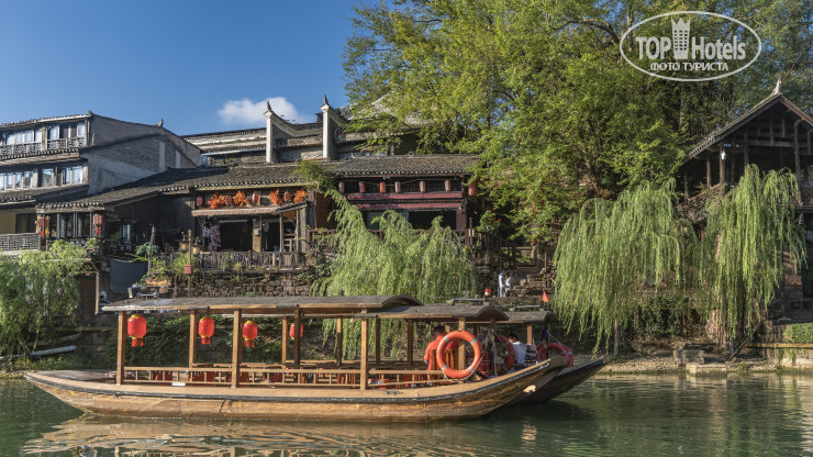 Фото Fenghuang Zui Xiang Xi Hotel